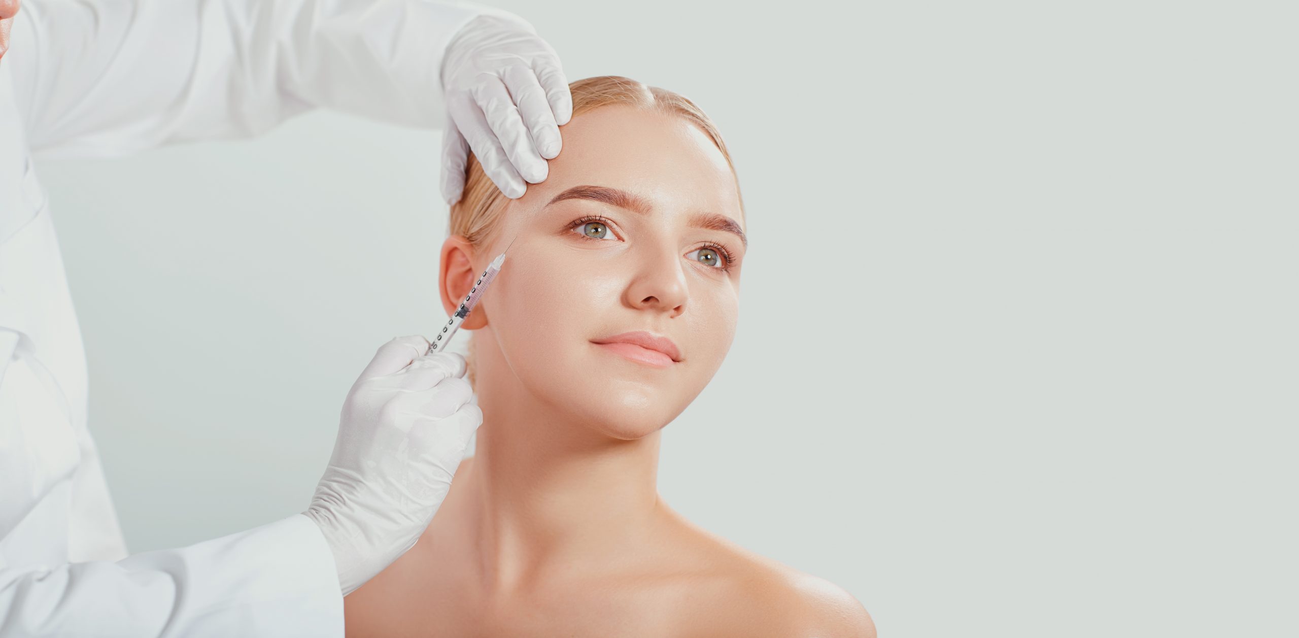 Cosmetic injection, for a woman's face.